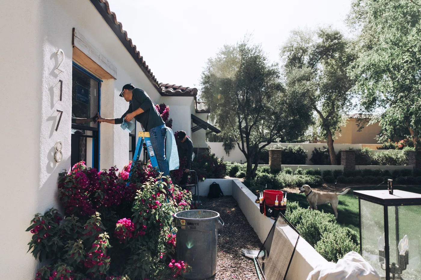 Relentless Construction crew installing a new window